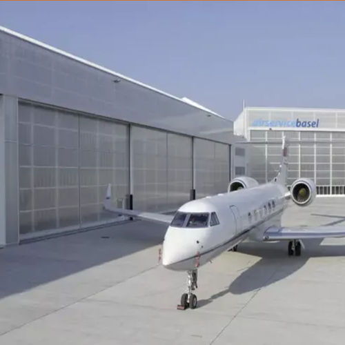 Porta per hangar - Shanghai Kenvo Door Co., Ltd - scorrevole / in acciaio / in acciaio galvanizzato