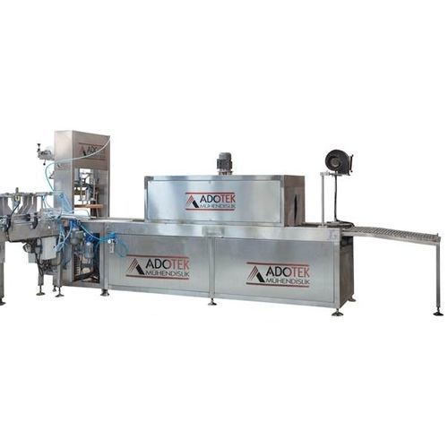 Macchina per imballaggio automatica - ADK 314 - Adotek Machine - con tunnel di retrazione / per alimenti / per l'industria agroalimentare
