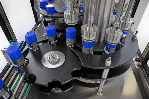 Incapsulatrice rotativa - R and R Aerosol Systems - interamente automatica / per lattine / per l'industria chimica