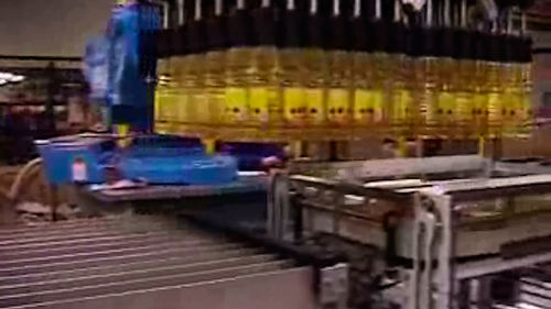 Pallettizzatore per bottiglie PET - Sinterpack - robotizzato / per l'industria dell’imbottigliamento
