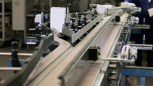Pallettizzatore per cartone - Sinterpack - robotizzato / per casse / automatico