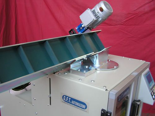 Alimentatore a nastro - G.F.T. AUTOMAZIONI - per macchina di imballaggio / a motore / in continuo