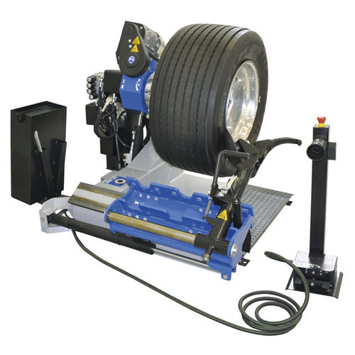 Smontagomme per camion - S 557 - GIULIANO INDUSTRIAL S.p.A. - automatico / orizzontale / elettroidraulico