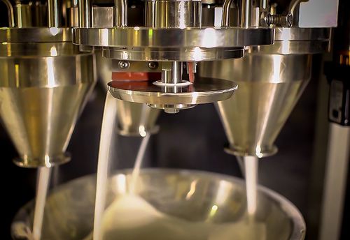 Alimentatore per polveri - P series  - Tekna - a vibrazione / a disco / per liquidi
