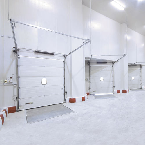 Porta scorrevoli - KOPRON SPA - sezionale / industriale / per hangar