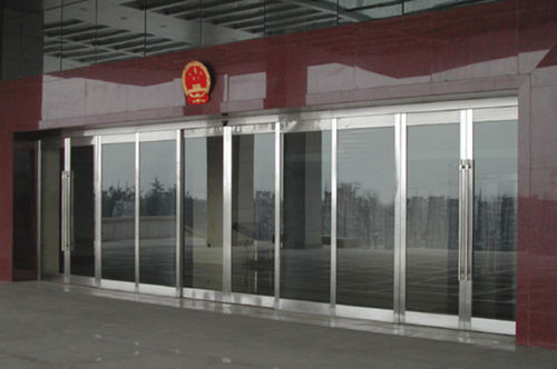 Porta scorrevole - Shen Zhen Hui Trade Industry Co., Ltd. - in metallo / da esterno / automatica
