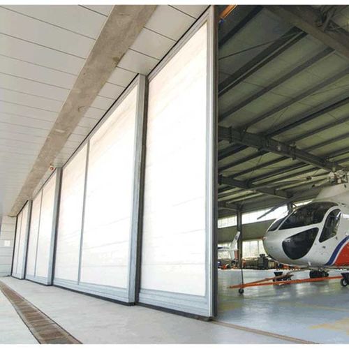 Porta per hangar - YUOU (LUOYANG) DOORS AND WINDOWS TECHNOLOGY CO., LTD. - scorrevole / in acciaio / in acciaio galvanizzato
