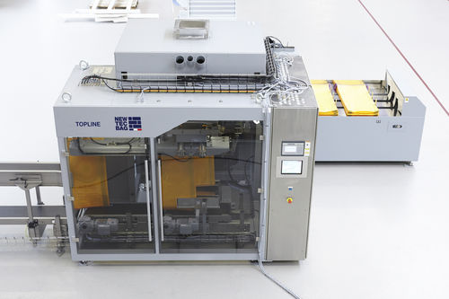 Confezionatrice orizzontale - TOPLINE® - NEWTEC BAG PALLETIZING - flow-pack / automatica / per l'industria agroalimentare