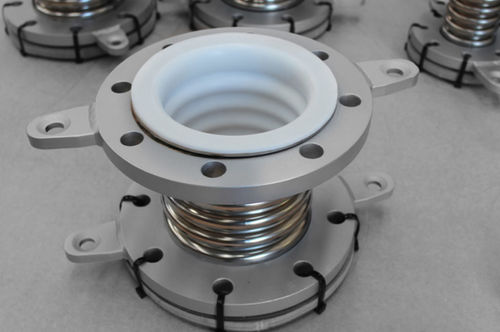 Compensatore di dilatazione in metallo - Macoga, S.A - PTFE / rotondo / con flangia