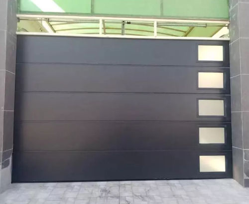 Porta scorrevole - BRDECO - sezionale / in acciaio galvanizzato / per interno