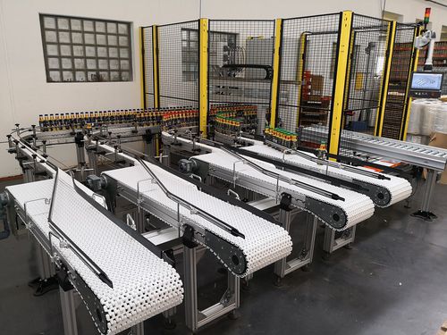 Cella robotizzata pick and place - staedler automation AG - per bottiglie / prensile