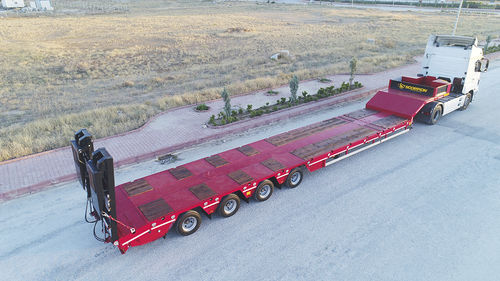 Semirimorchio gooseneck - HKM4 - SCORPION TRAILER - con sospensione pneumatica / a 4 assi / trainato