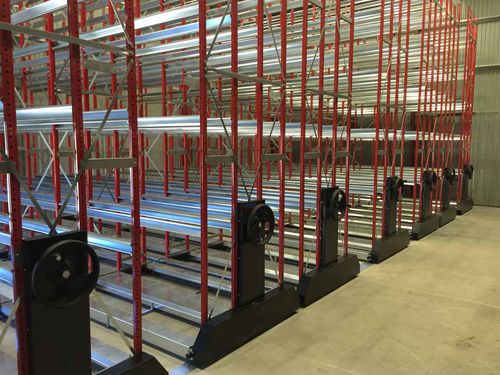 Scaffalatura per magazzino di stoccaggio - METALCOOP s.c.a.r.l. - per movimentazione / mobile / modulare