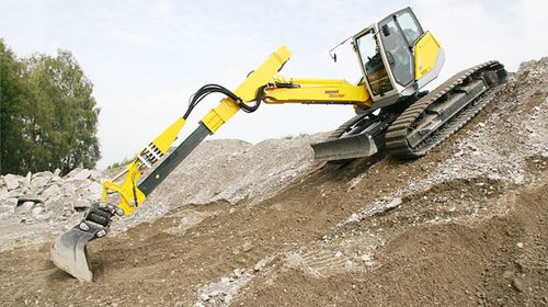 Escavatore intermedio - M515 - Menzimuck - cingolato / diesel / con braccio telescopico