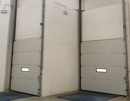 Porta sezionale - Moreschi Chiusure Industriali S.r.l. - in acciaio / in acciaio galvanizzato / per interno