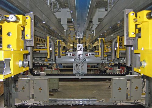 Linea di impilaggio per piastrine - NSM MAGNETTECHNIK GmbH - a nastro / per applicazioni automobilistiche