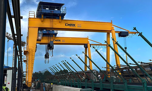 Gru a cavalletto su guida di scorrimento - CMAK Crane Systems - per container / per cantieri di prefabbricati / per metropolitana