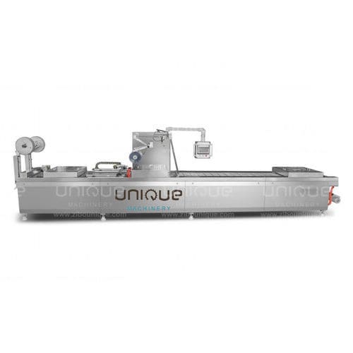 Macchina di confezionamento automatica - Zibo Unique Machinery Co., Ltd. - sottovuoto / in pellicola / per alimenti