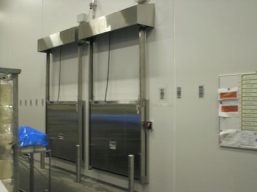 Porta scorrevole verticale - MV0601K - DAN-doors - in metallo / per cella frigorifera / industriale