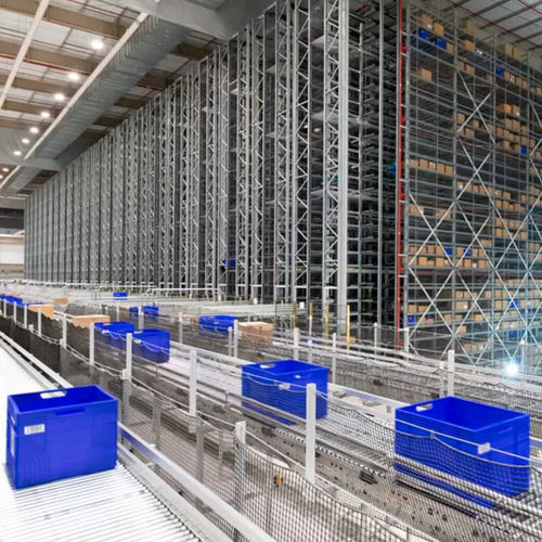 Trasloelevatore automatico - DEMATIC - per magazzino / per sistema di contenitori / per pallet