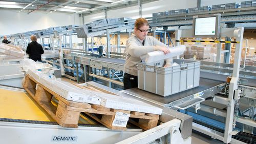 Pallettizzatore e depallettizzatore robotizzato - DEMATIC - per magazzino / per movimentazione / per casse