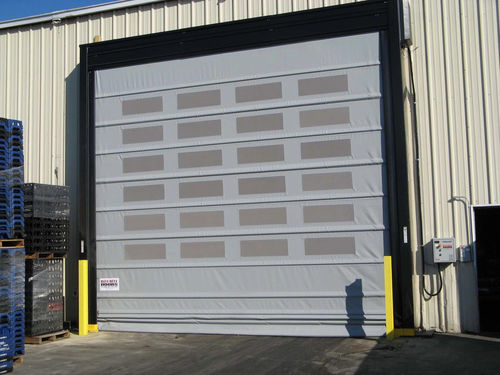 Porta ad impacchettamento - TrakLine™ Series - Rite-Hite - a libro / ad avvolgimento / in tessuto
