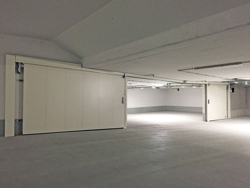 Cancello insonorizzato - ACOUSTICLINE 45 DB - Jansen Tore GmbH & Co.KG - scorrevole / a comando elettrico / in acciaio