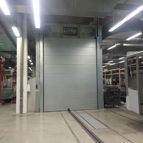 Porta resistente al calore - Jansen Tore GmbH & Co.KG - sezionale / in metallo / industriale