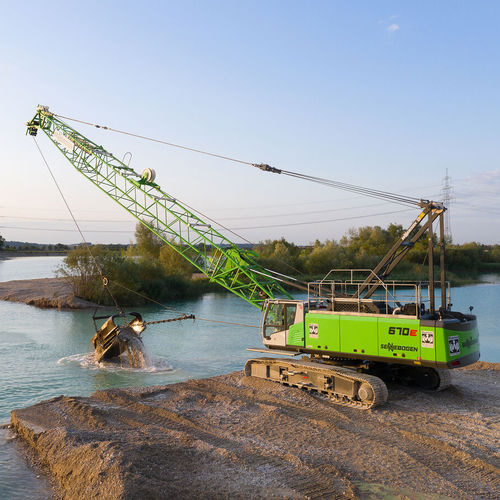 Gru cingolata - 670 HD  - SENNEBOGEN Maschinenfabrik GmbH - con braccio / per cantiere / per movimentazione