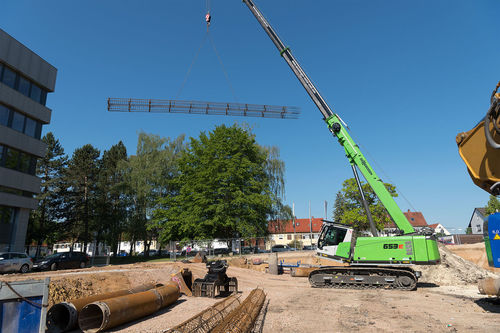 Gru telescopica - 653 E - SENNEBOGEN Maschinenfabrik GmbH - cingolata / con braccio / per cantiere