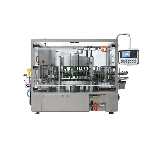 Macchina di etichettatura automatica - TORNADO W - HEUFT SYSTEMTECHNIK - per bottiglie / per l'industria delle bevande / con colla termofusibile