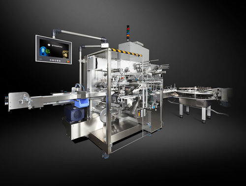 Macchina per imballaggio automatica - LEKO-LUP - Stampac GmbH - con pellicola piegata / per prodotti al cioccolato / per tavolette di cioccolato
