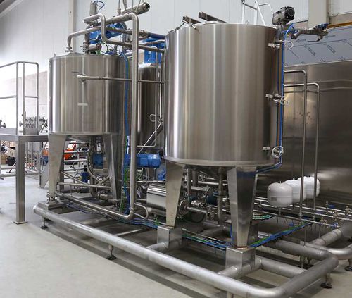 Macchina di fusione di cioccolato - CHOCOMELT - FECOATEC s.l. - di grasso / per l'industria agroalimentare / con dosatore