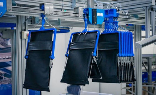 Smistatore per la logistica - ILS - Schönenberger Systeme GmbH - per l'industria tessile / automatico / manuale