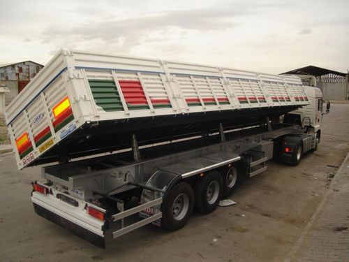Rimorchio a pianale - lider trailer - con cassone ribaltabile / per contenitore / a 3 assi