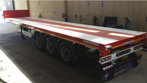 Rimorchio a pianale - lider trailer - per contenitore / di prodotti lunghi / a 3 assi