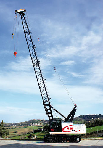 Gru cingolata - M30 - MAIT S.p.A. - tralicciata / con braccio / per cantiere