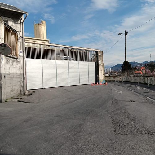 Porta scorrevole - PUERTAS SECADES - a spirale / in acciaio galvanizzato / in tessuto