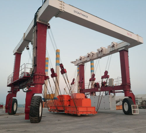 Gru a cavalletto di sollevamento laterale - BH series - Xinxiang MAGICART Cranes Co., Ltd - gommata / per cantieri di prefabbricati / per opere di ingegneria civile