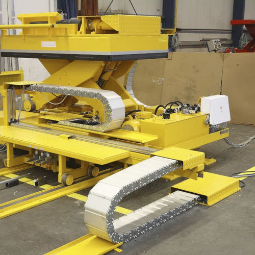 Sistema di trasporto su guida di scorrimento - Wasser Schnitt, S.L. - multi carrello / con motore elettrico / per l'industria automobilistica