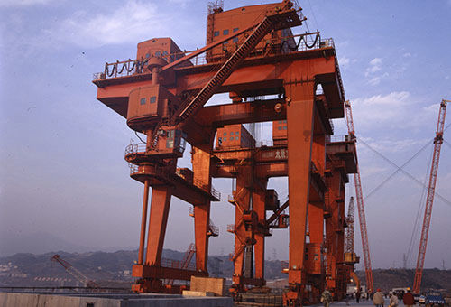 Gru a cavalletto per centrale idroelettrica - TAIYUAN HEAVY INDUSTRY CO.,LTD - su guida di scorrimento / elettrica