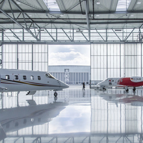Porta per hangar - Butzbach GmbH Industrietore - scorrevole / sezionale / in acciaio inossidabile