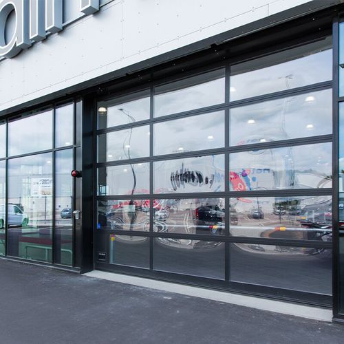 Porta sezionale - OH1042FG - ASSA ABLOY Entrance Systems - in alluminio / vetrata / industriale