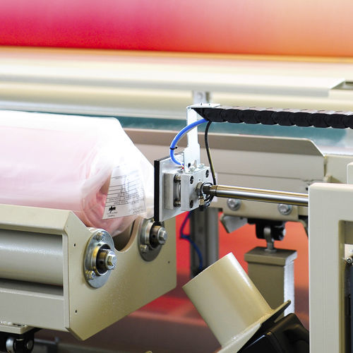 Stampante-applicatore di etichette autoadesive - Comatex Textile Machinery - per rotoli tessili / per tessili