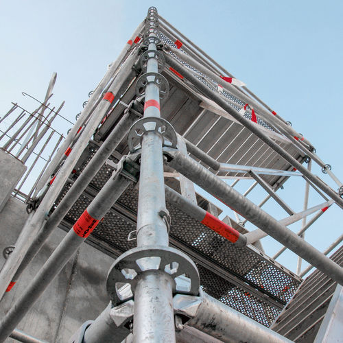 Ponteggio a torre fisso - MTT - MEVA Schalungs-Systeme - per facciata / modulare / con scala