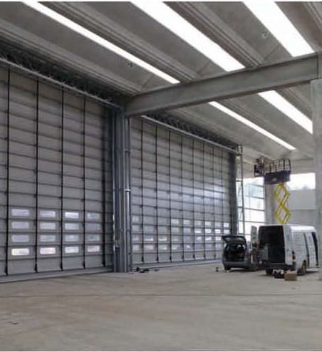 Porta ad impacchettamento - Pack® - B.M.P. srl - in acciaio galvanizzato / per hangar / industriale