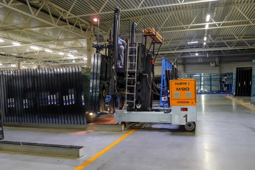 Carrello elevatore laterale elettrico - M 90 - HUBTEX - con conducente seduto / per movimentazione / multidirezionale