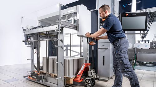 Alimentatore per cartoni - TLM Comfort - Gerhard Schubert GmbH - a nastro / sottovuoto / per macchina di imballaggio