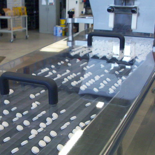 Riempitrice chiuditrice per prodotti farmaceutici - RT - PMR System Group - per compresse / per recipiente / automatica