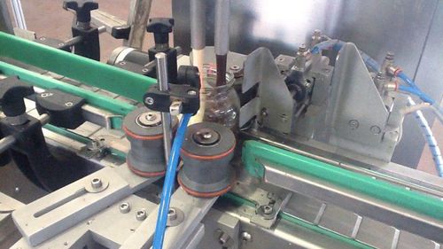 Riempitrice tappatrice etichettatrice automatica - RTE2U - PMR System Group - per container / per prodotti al cioccolato / per capsula Twist